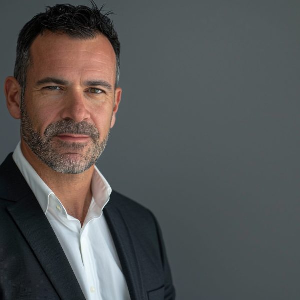 Male IT Director in Charcoal Studio White Business Background High Resolution Image